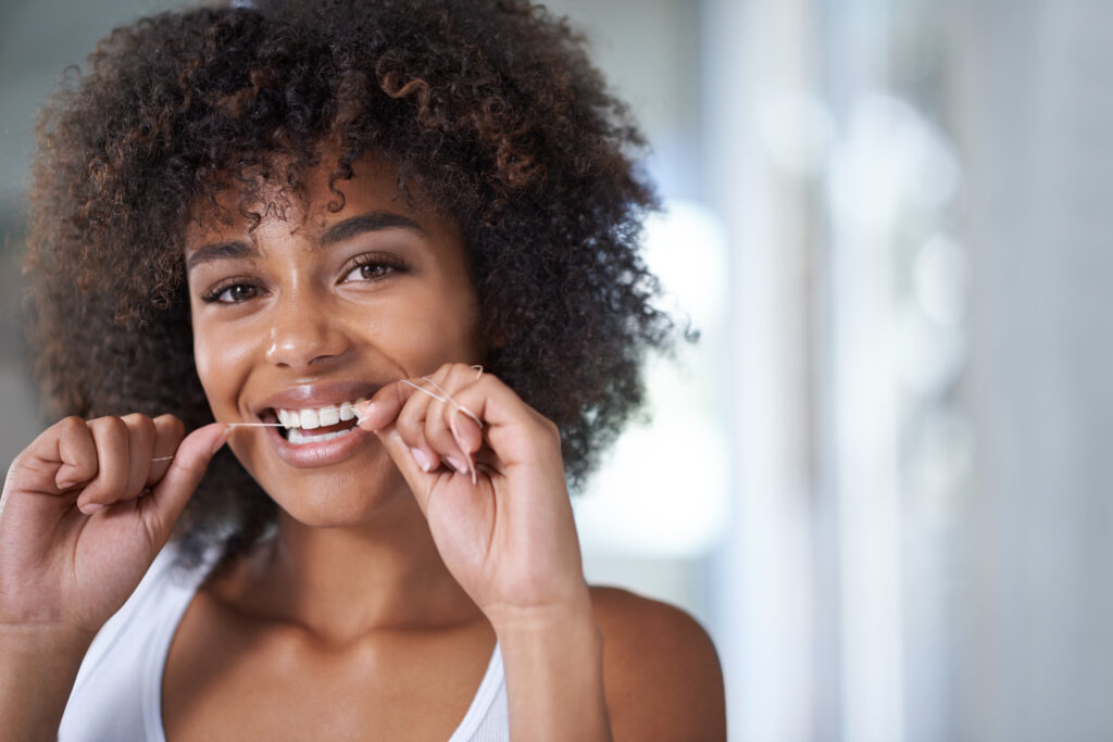 woman flossing